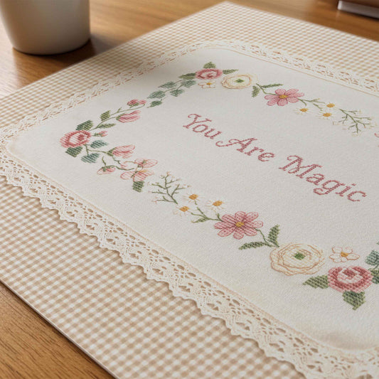 Vintage floral wall art with cross stitch style lettering and lace trim