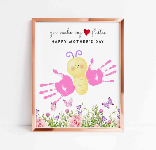 Framed Mother's Day card with a caterpillar and handprints on a white background