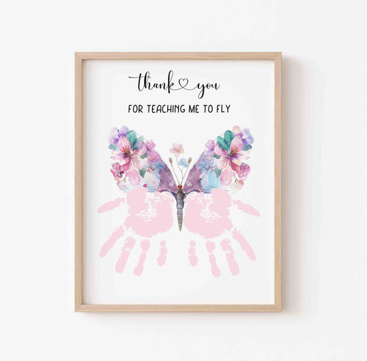Framed artwork with butterfly design and text on a white background