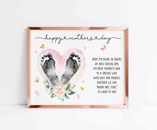 Framed Mother's Day card with heart-shaped footprint design and floral elements on a white background.