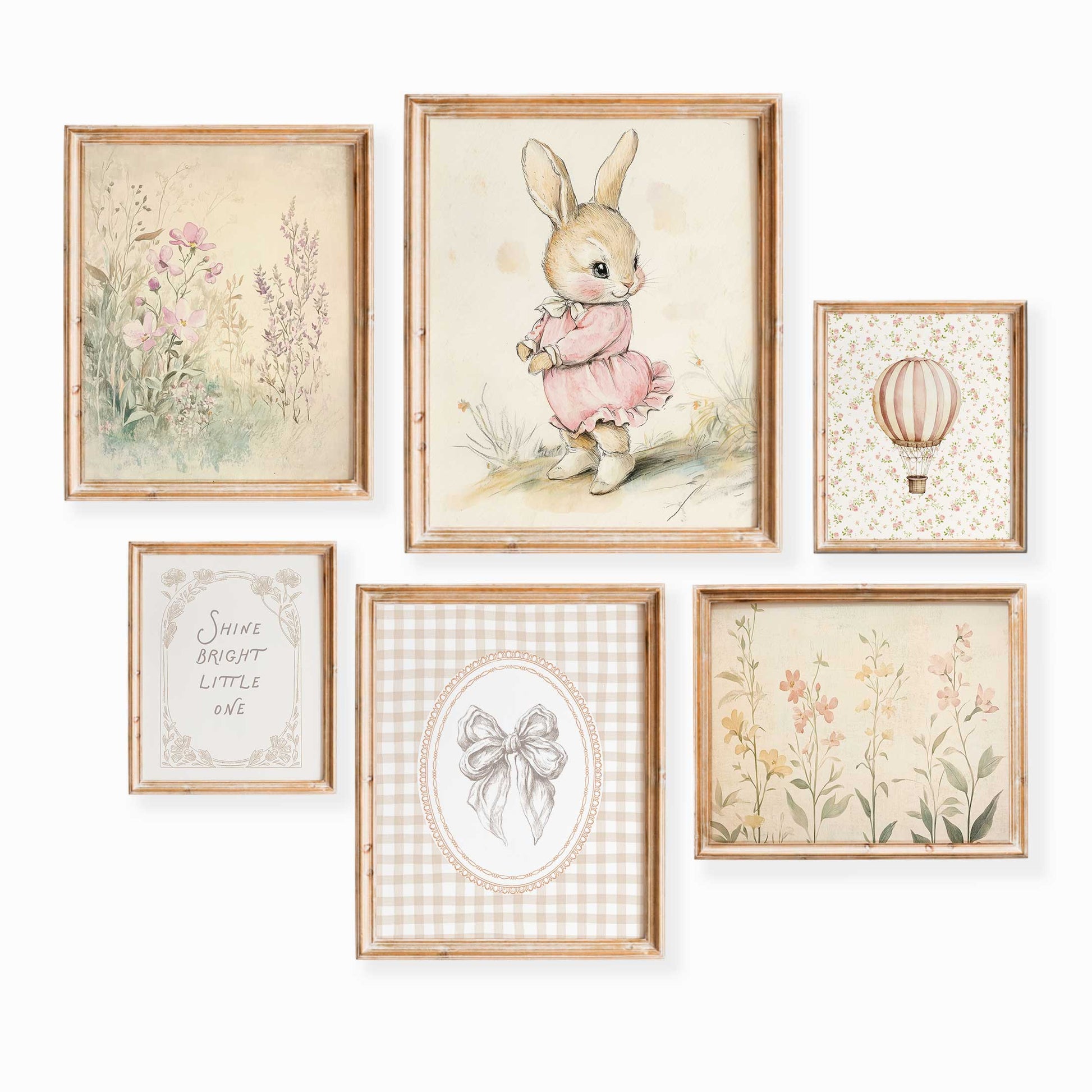Set of framed prints with a rabbit illustration and floral designs on a white background