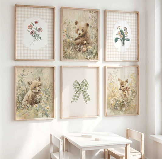 Six-piece cottagecore nursery gallery wall featuring baby bear, fox, and fawn in wildflowers, vintage botanical illustrations on beige gingham, and sage gingham bow in natural wood frames