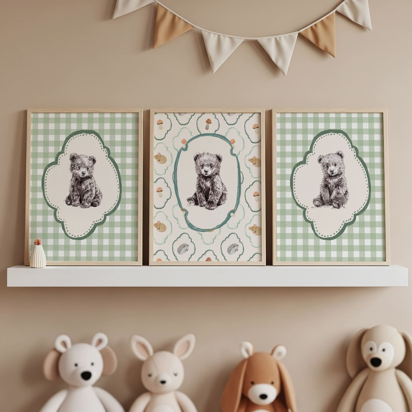 Three-piece vintage nursery art set featuring detailed pen and ink bear cub sketches in ornate frames on sage green gingham and whimsical woodland animal pattern backgrounds in natural wood frames