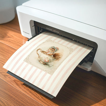 Printable nursery art of a vintage squirrel in a teacup with bonnet, pink stripe background, woodland animal theme for girl’s room.