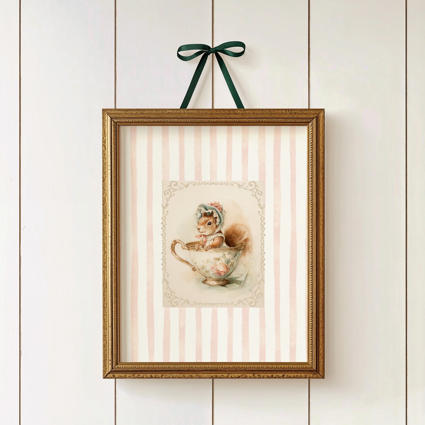 Printable nursery art of a vintage squirrel in a teacup with bonnet, pink stripe background, woodland animal theme for girl’s room.