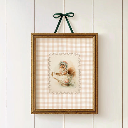 Vintage printable nursery art of a squirrel in a teacup with bonnet, beige gingham background, woodland animal wall decor.