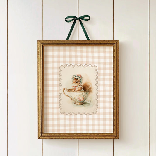 Vintage printable nursery art of a squirrel in a teacup with bonnet, beige gingham background, woodland animal wall decor.