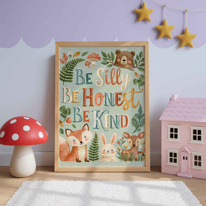 Retro wall art with Be Silly Be Honest Be Kind in colorful lettering and woodland animals peeking over a branch