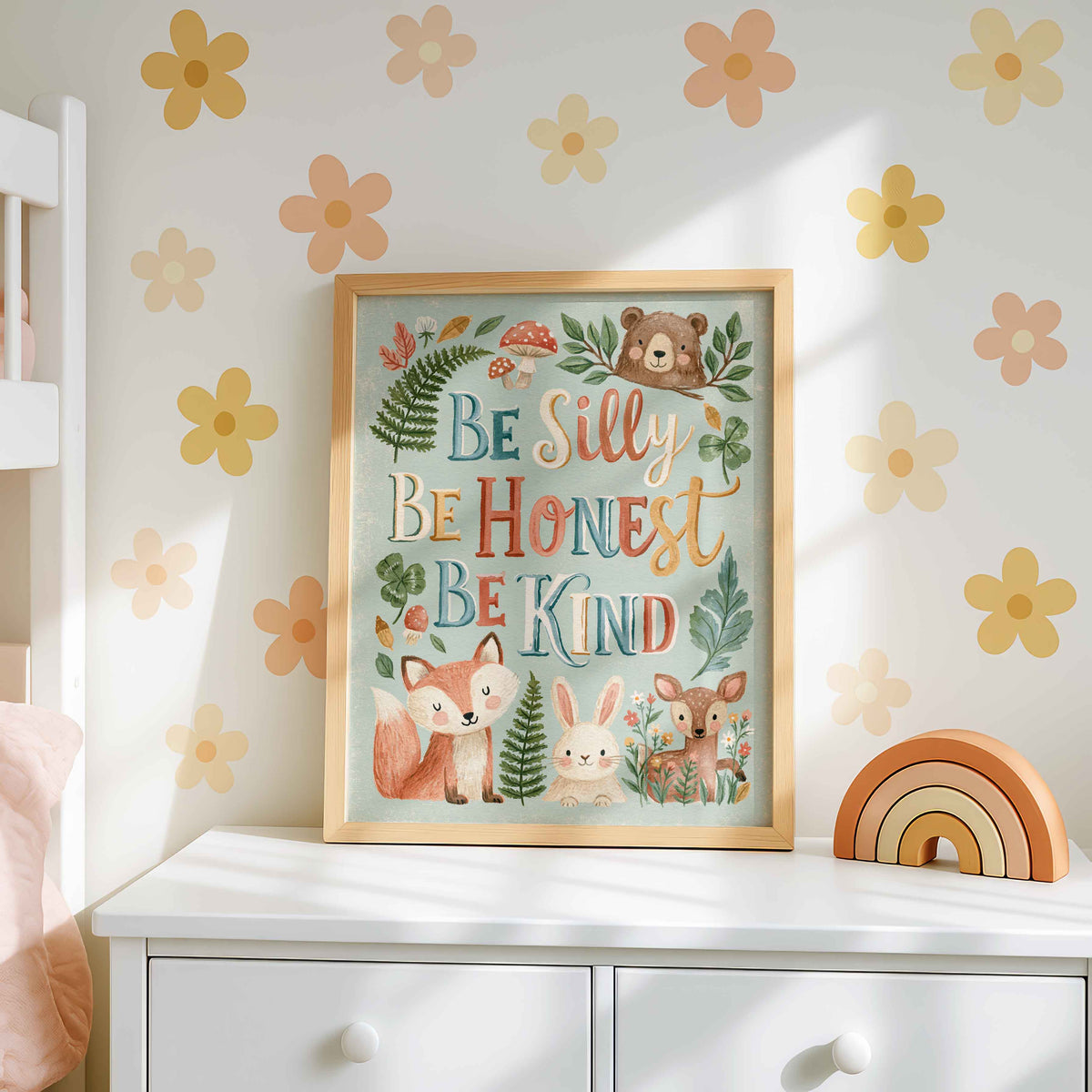 Retro wall art pairing a fox, a bunny, a fawn and a bear peeking over a branch with ferns, clovers and red toadstools