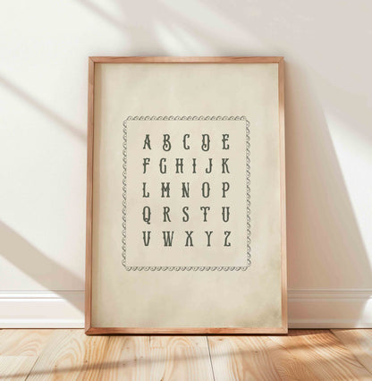 Hand lettered alphabet chart print styled for a vintage woodland nursery room