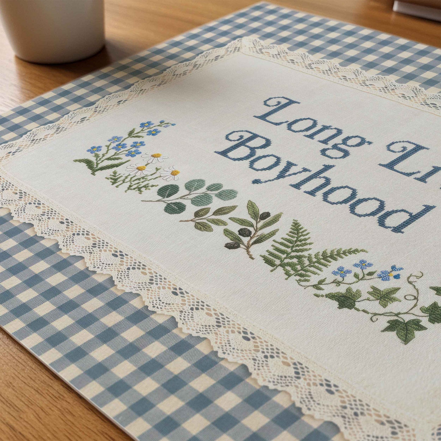 Vintage cross stitch style nursery print with blue and white gingham background