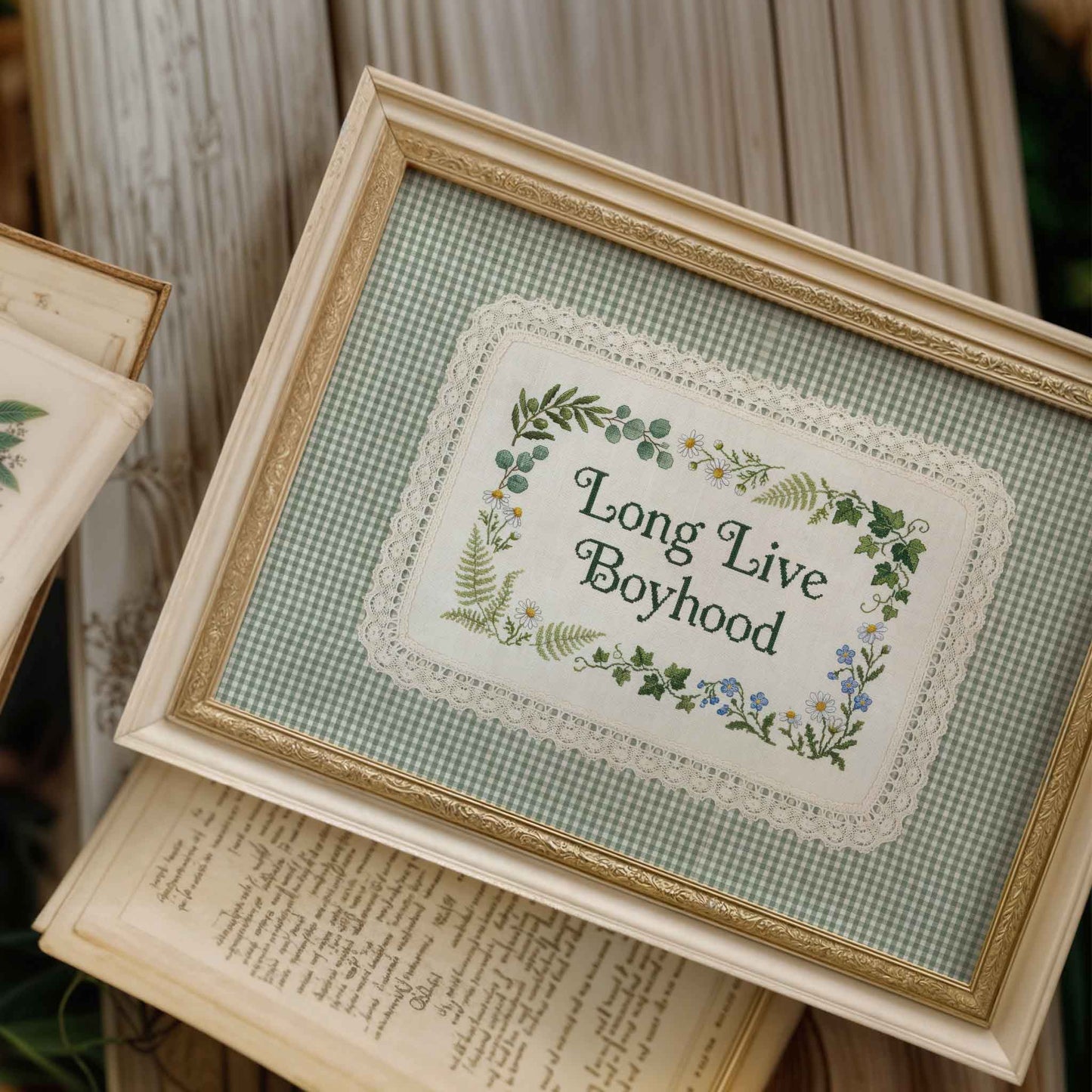 Framed Long Live Boyhood print with daisy border for a nursery wall