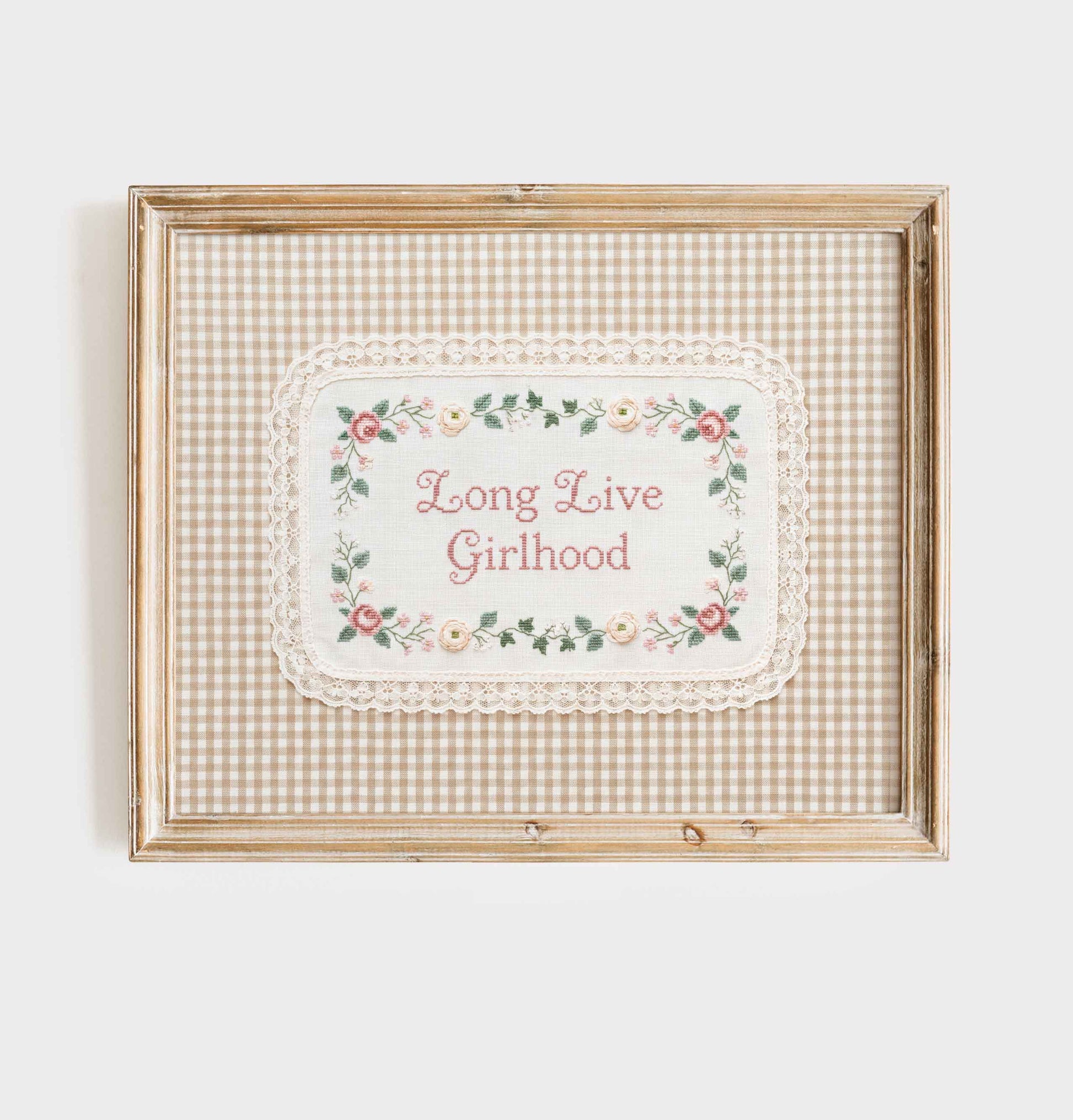 Framed faux embroidery quote print with rose vine border for a girls nursery wall