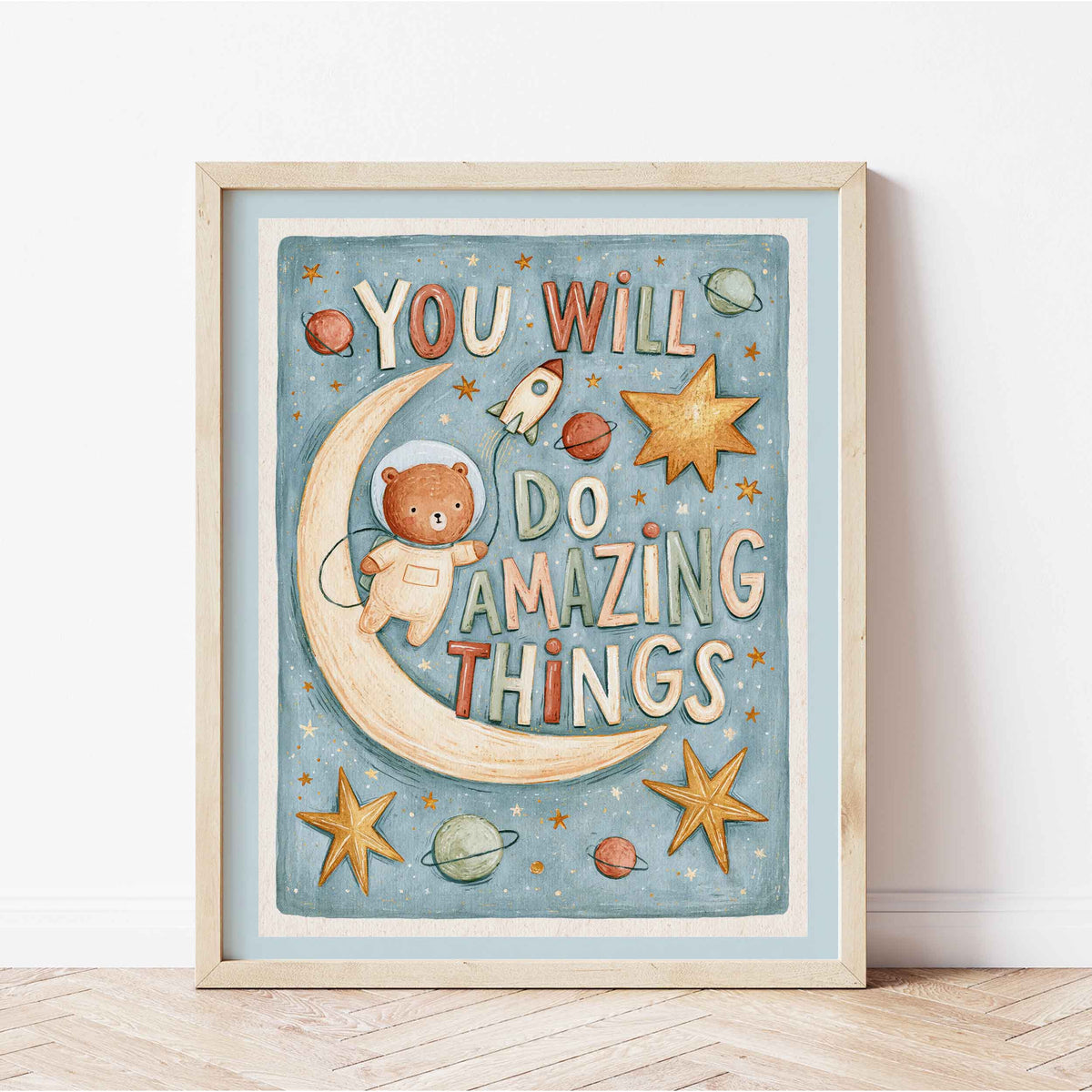 Retro wall art with planets and a tiny rocket