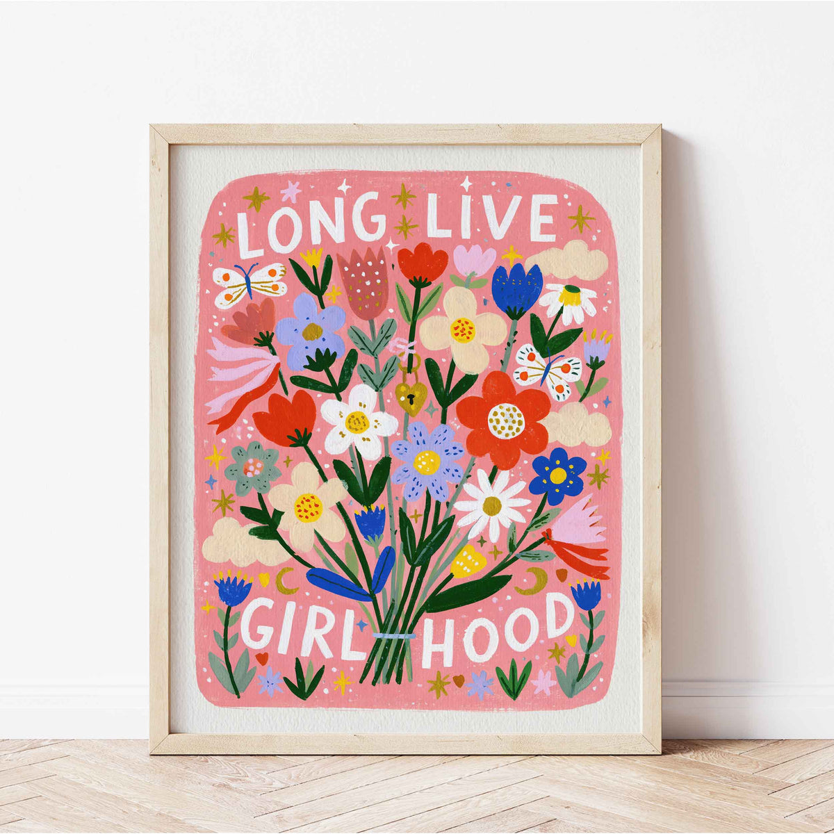 Retro wall art with a tiny golden heart lock among the stems