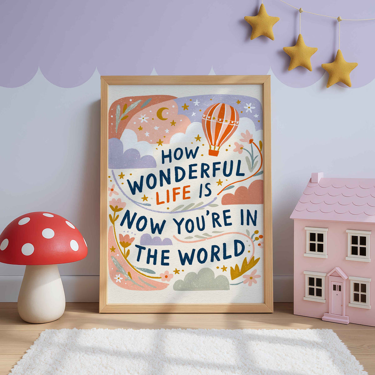 Retro wall art of a striped orange hot air balloon in a lavender and blush sky with clouds, stars and a crescent moon