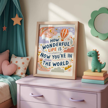 Retro hot air balloon wall art with ribbons of flowers around the lettering