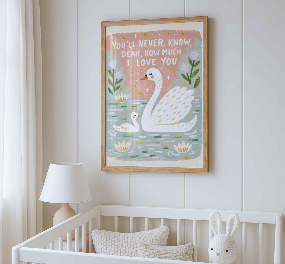 Soft white hand lettering on a retro swan and cygnet wall art print