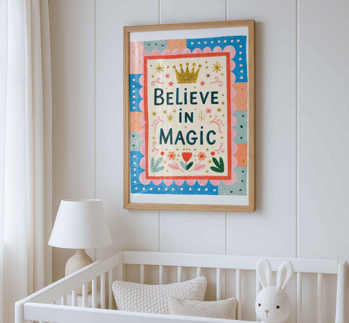 Retro wall art featuring a golden crown above navy lettering