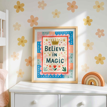Retro wall art pairing a golden crown above navy lettering with a red frame and scalloped pink border