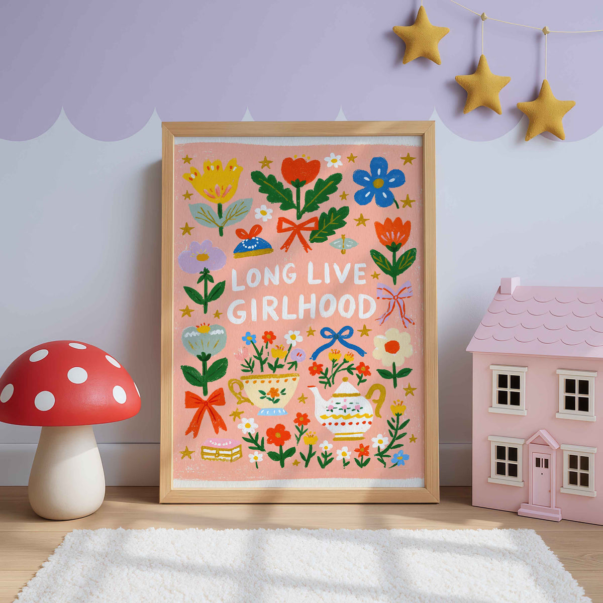 Retro tea party wall art with a teapot, a flowered teacup and bows on peach pink, lettered Long Live Girlhood