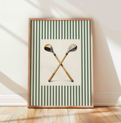 Crossed golf clubs print on sage green stripe for a preppy country club nursery