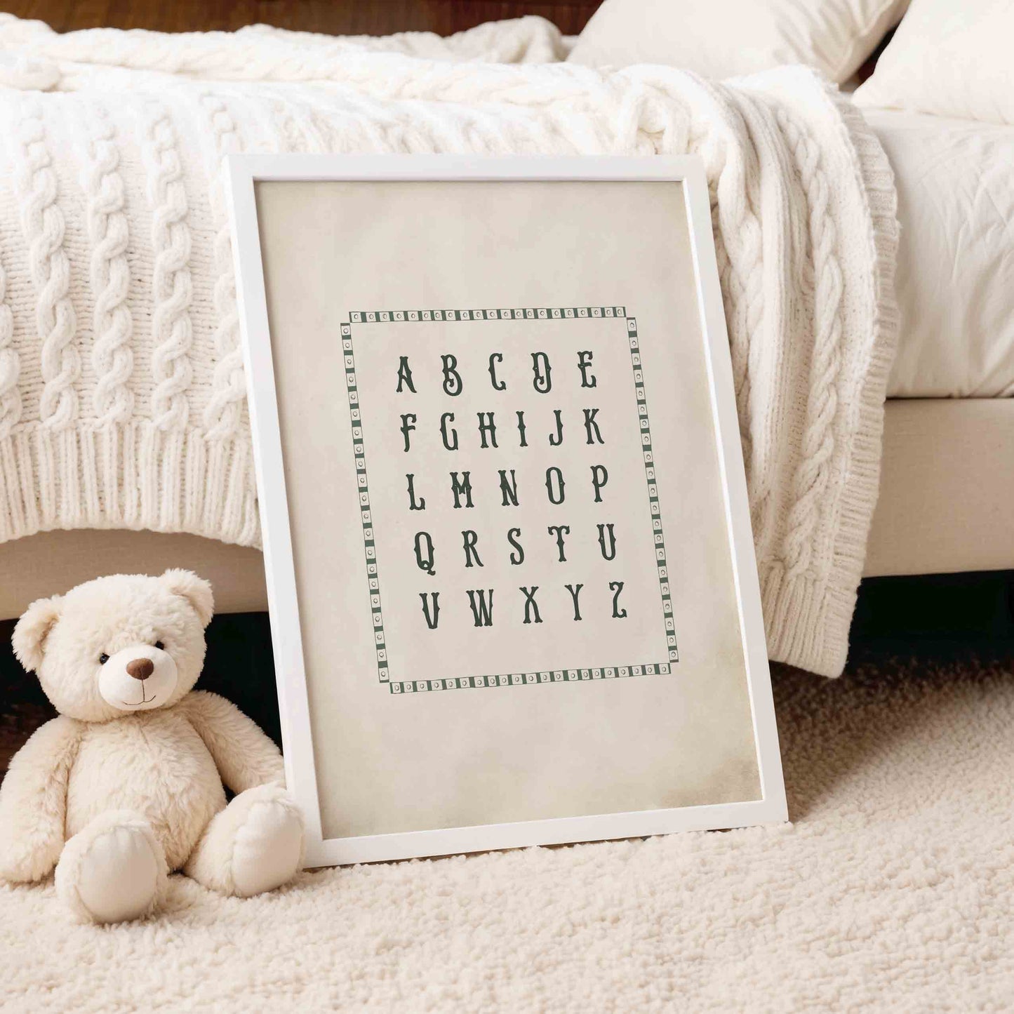 Vintage alphabet chart print styled on a knit blanket for a golf nursery room