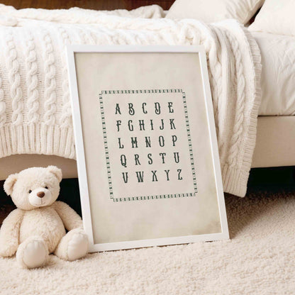 Vintage alphabet chart print styled on a knit blanket for a golf nursery room