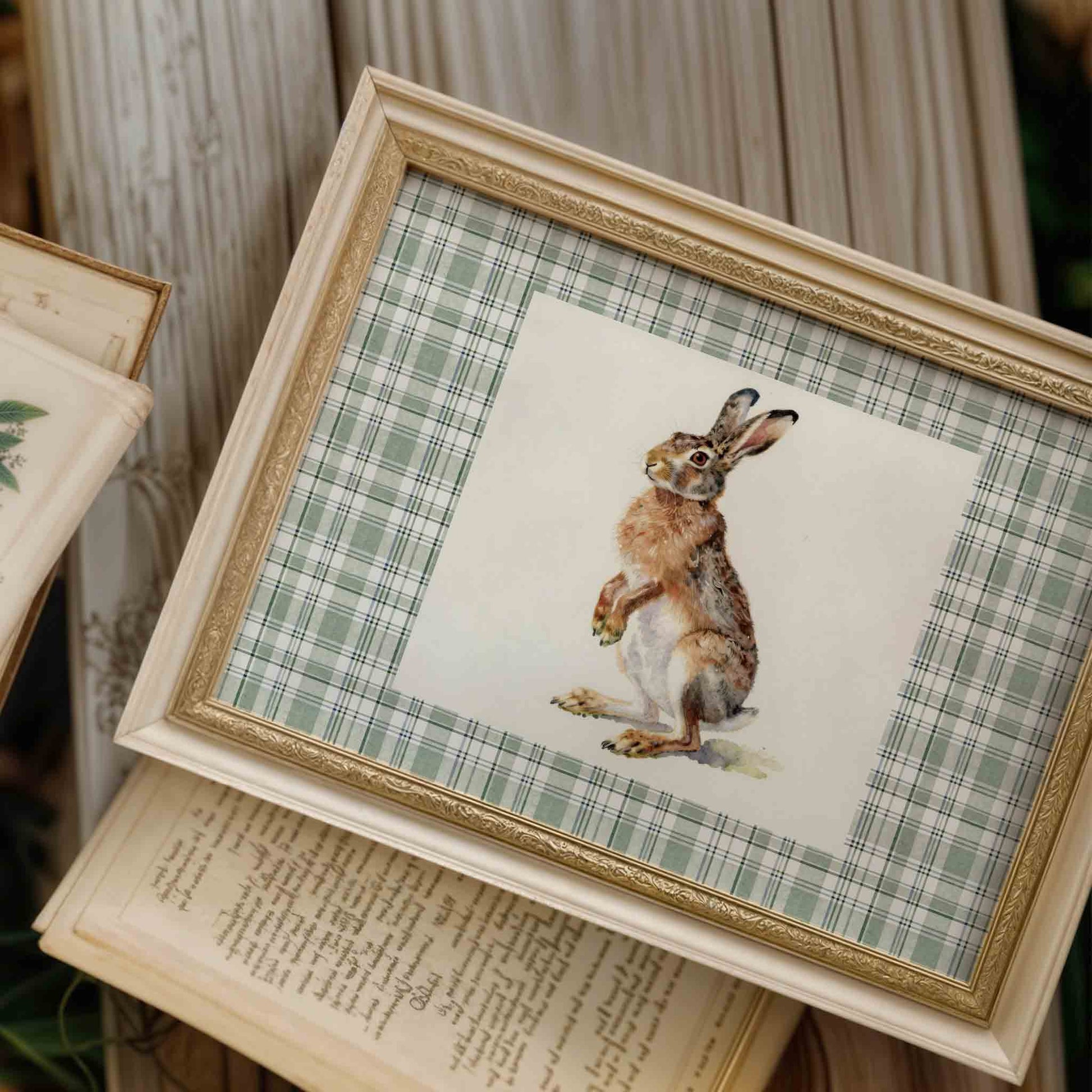Vintage hare print on green plaid for a rustic woodland boys nursery gallery wall