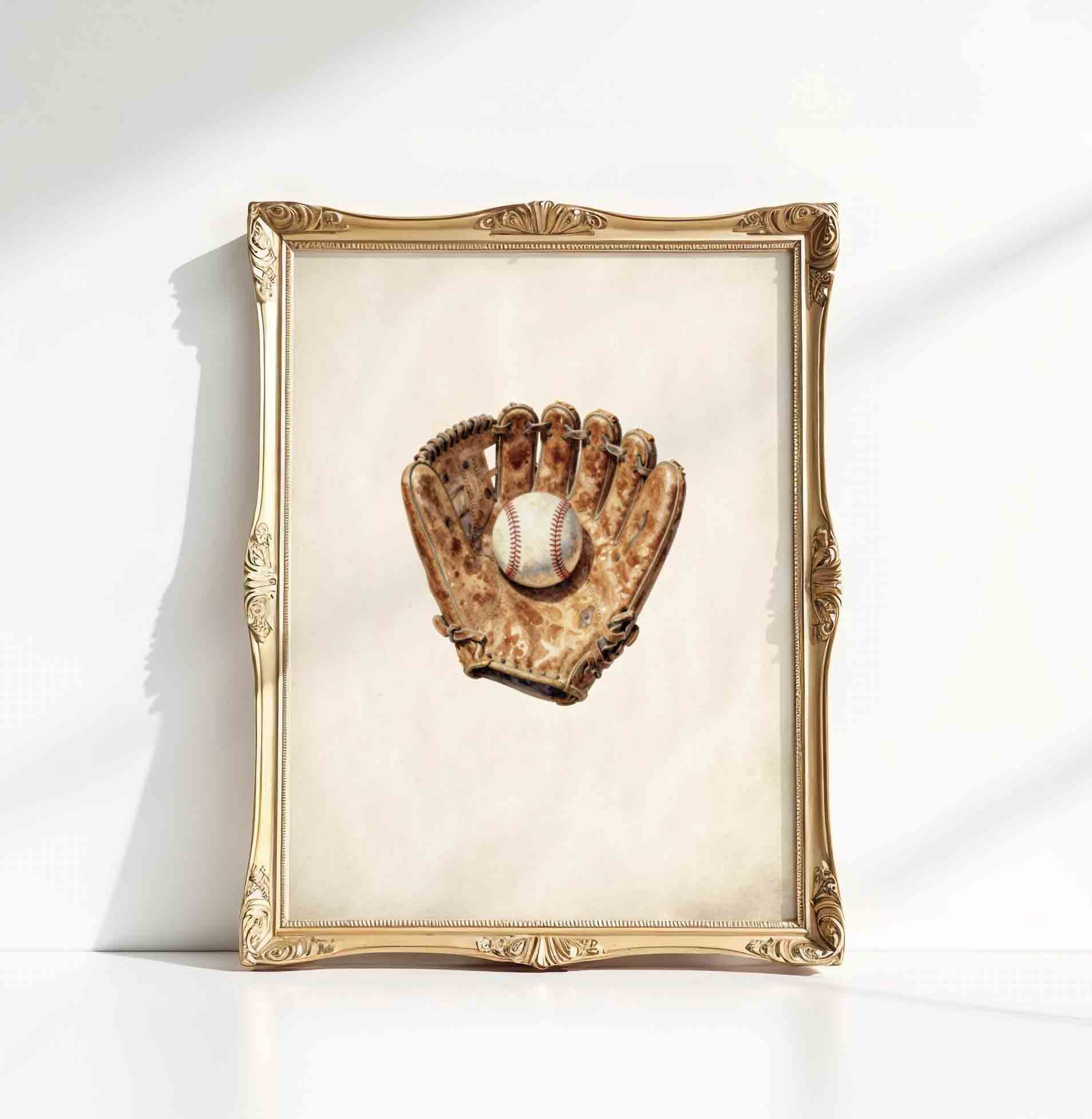 Watercolor baseball glove print in a gold frame styled for a boys nursery room