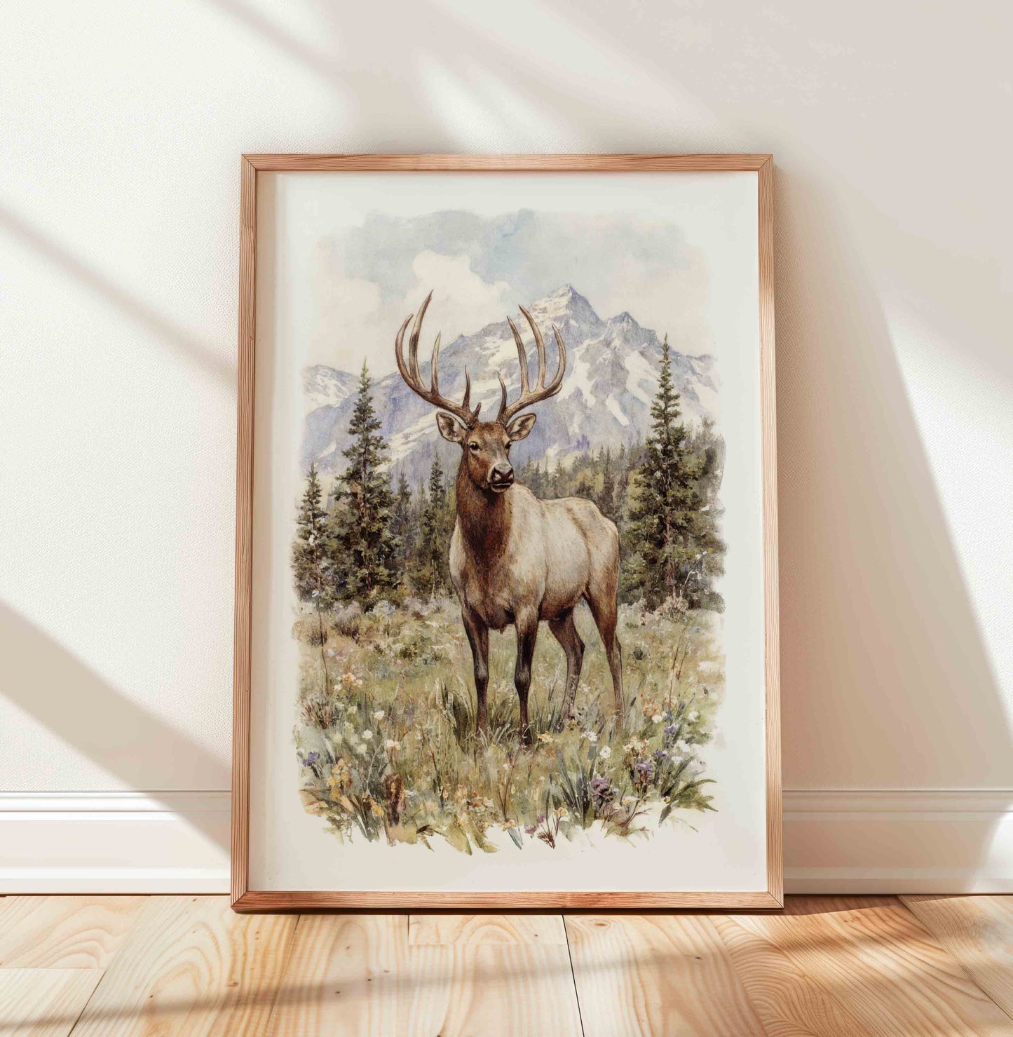 Watercolor deer in forest landscape print styled for a vintage woodland nursery room