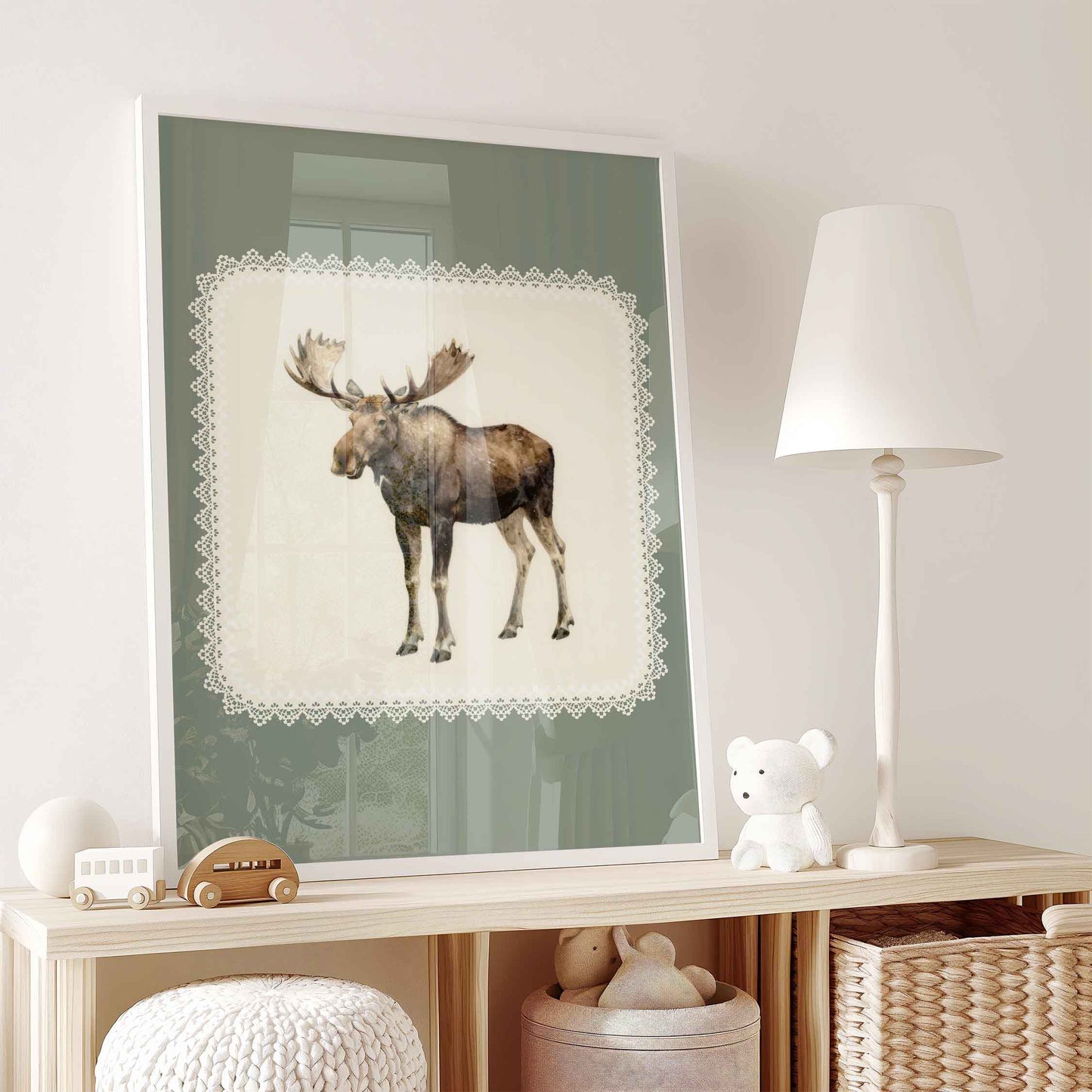 Watercolor moose print on sage green styled for a rustic duck hunting nursery room