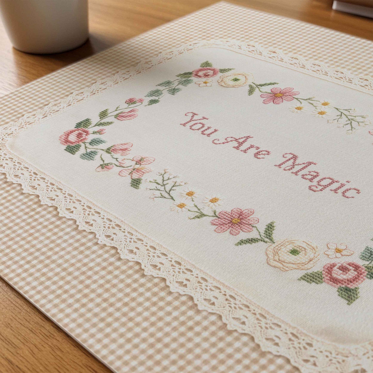 Vintage floral wall art with cross stitch style lettering and lace trim