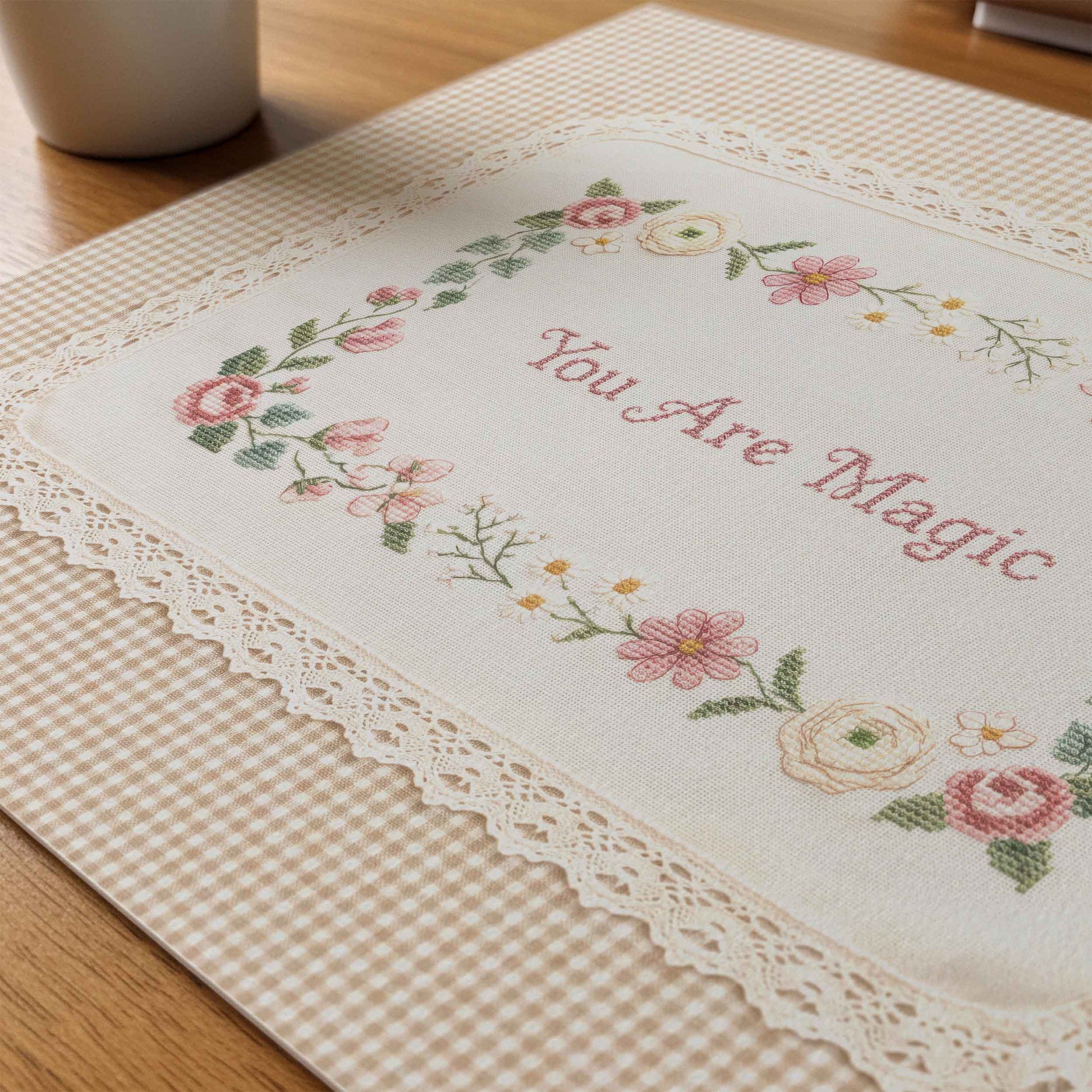 Vintage floral wall art with cross stitch style lettering and lace trim