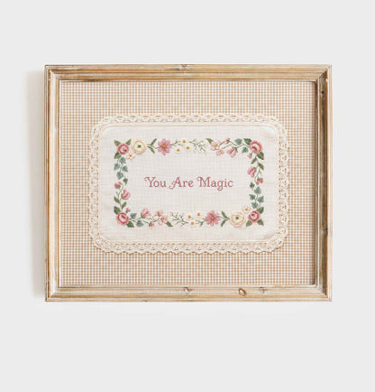 Grandmillennial style You Are Magic print in a wood frame for a nursery wall
