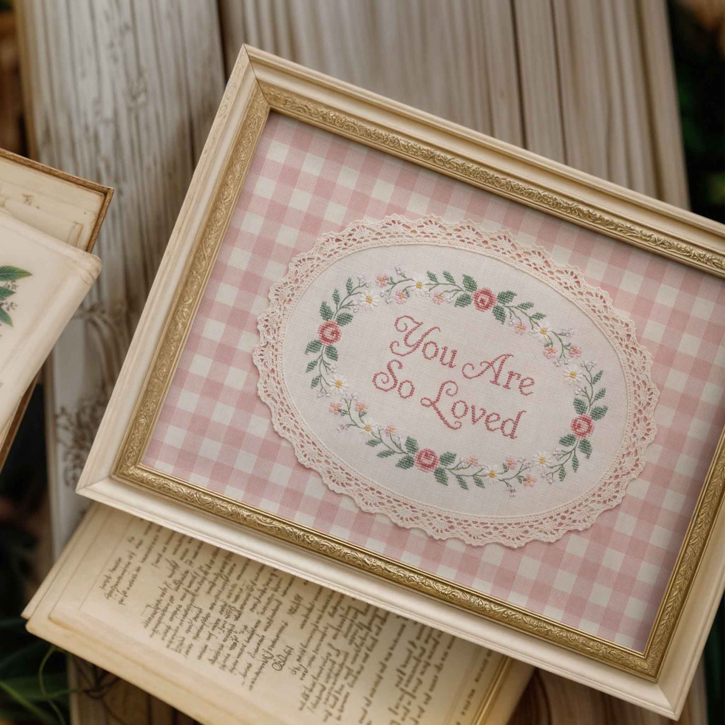 Coquette style nursery print with lace frame and gingham backdrop